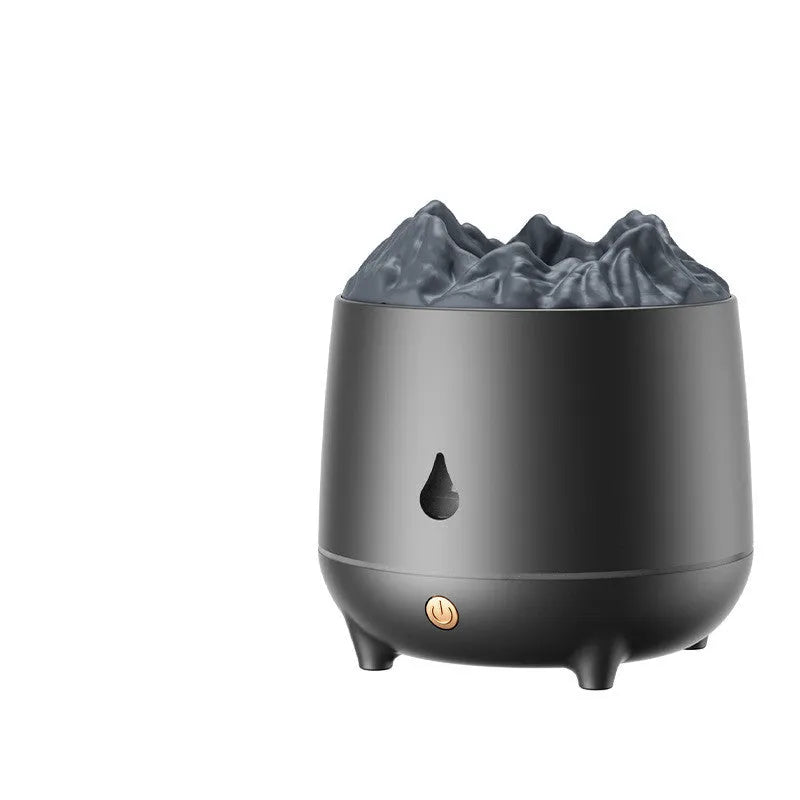 White volcano-shaped humidifier with flaming mountain design on wooden surface