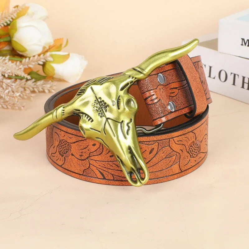 Men's cow head buckle belt in imitation leather with alloy buckle showing embossed detailing
