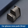 Compact zinc alloy and leather glasses clip for car dashboard, shown in available colours.