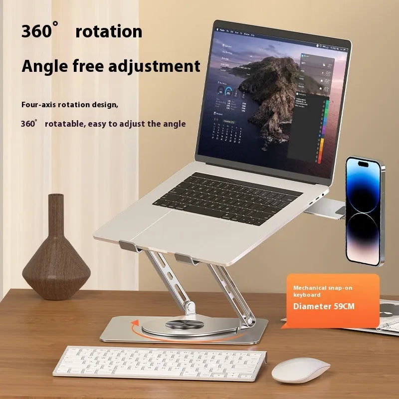 Silver carbon steel laptop stand with a side-mounted magnetic mobile phone holder on a desk