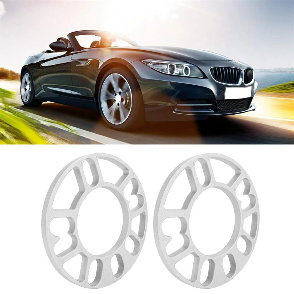 A metallic wheel hub widening gasket or spacer in various thicknesses for automotive modification.