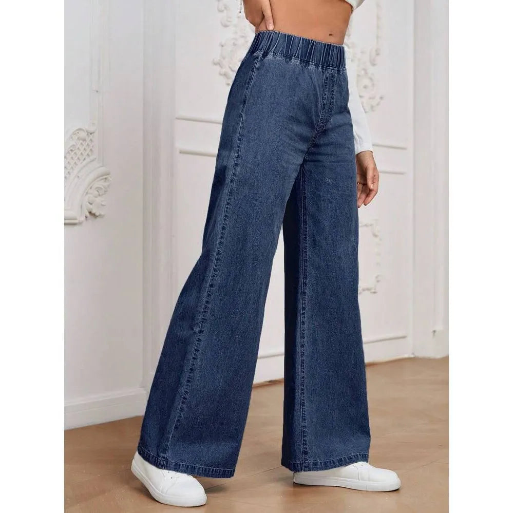 Light blue washed wide-leg straight-leg women's jeans on a hanger, showing mid-waist and zip fly detail.