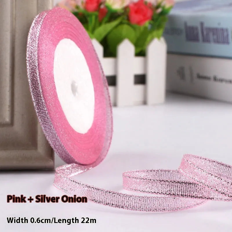 Roll of narrow 0.6cm wide polyester decorative ribbon in multiple colour options including metallic finishes