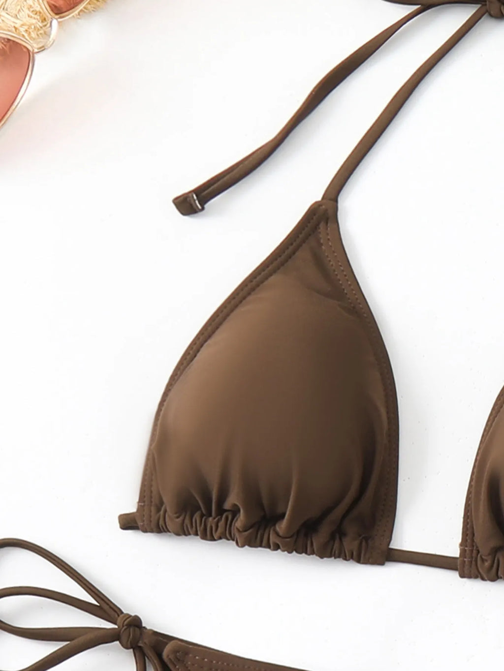 Women's brown three-piece split swimsuit set with bra, shorts, and blouse on a model.