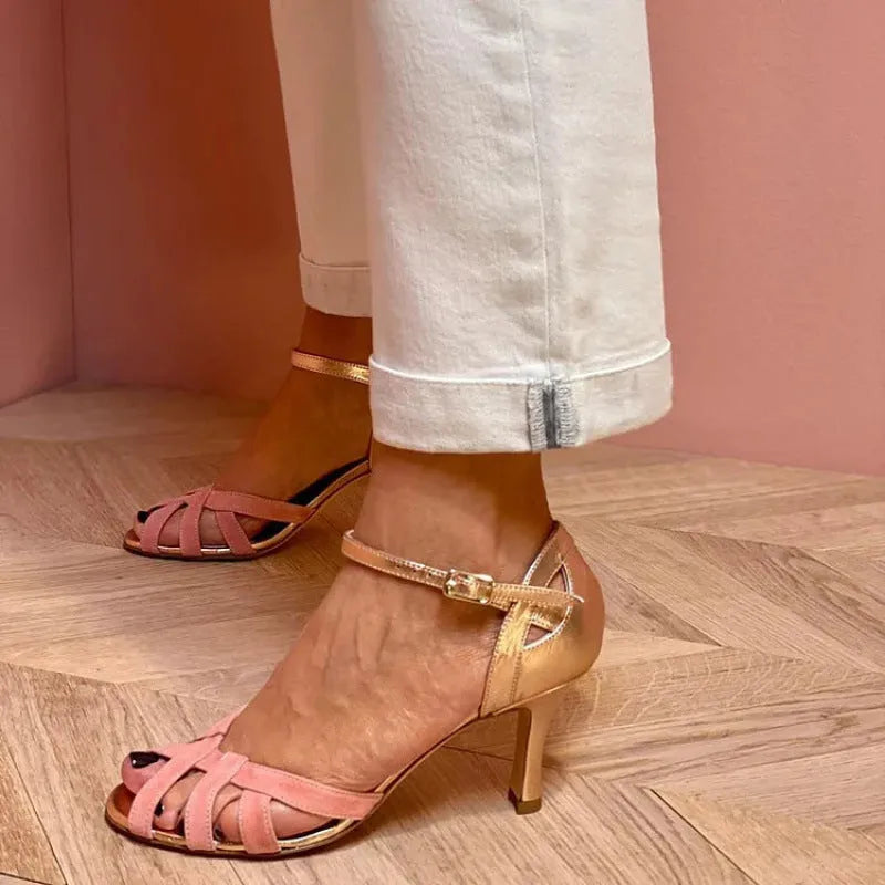 Pink plus size peep toe sandals with over-the-knee sock and buckle fastening on a herringbone toe holder