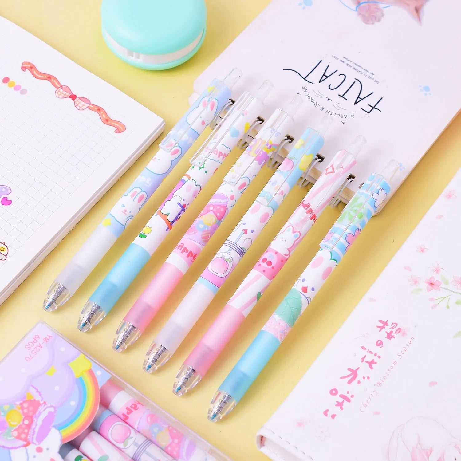 Six cartoon bunny design black ballpoint pens with 0.5mm tips in plastic packaging