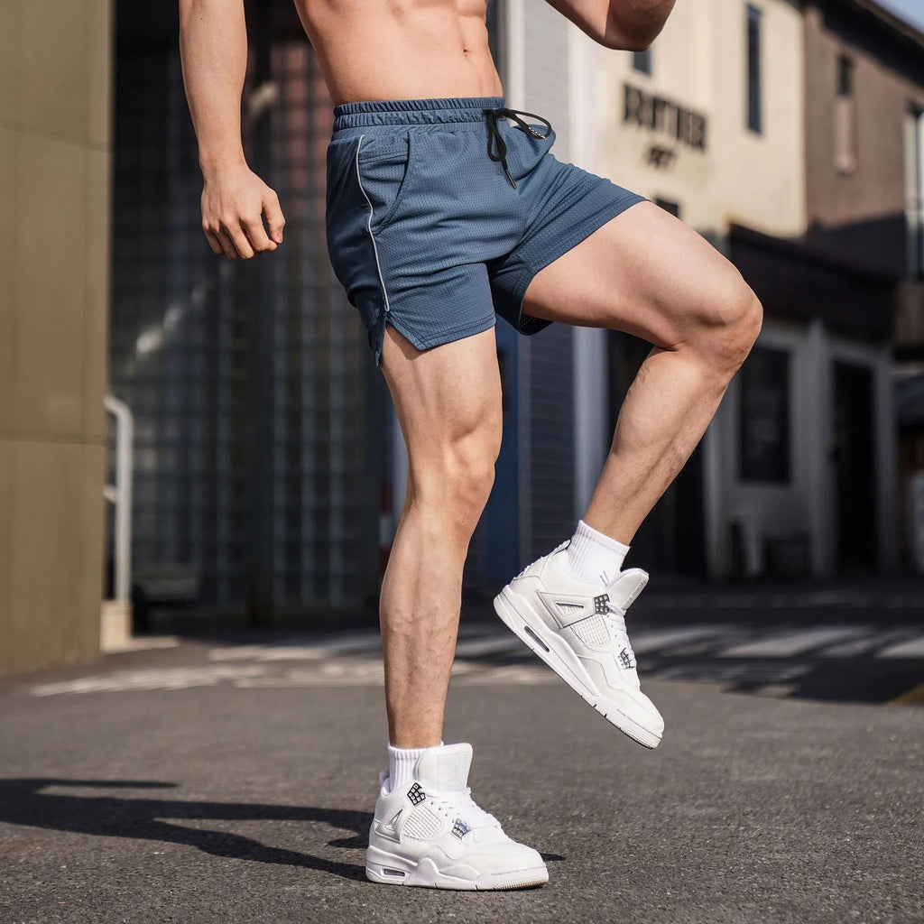 Men's straight fit polyester sports shorts in black, available in five sizes