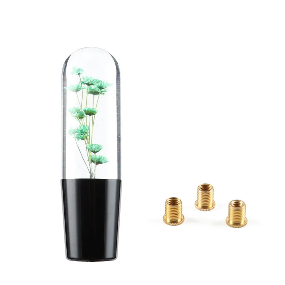 JDM crystal car gear knob with flower-in-water design, 15cm long, shown with three fitting adapters