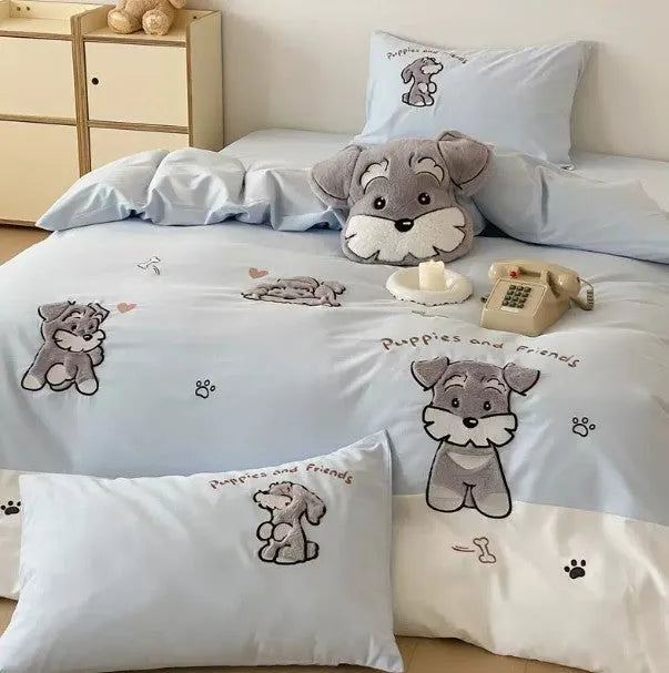 Schnauzer cartoon patterned bedding set with quilt cover, sheet, and pillowcases on bed