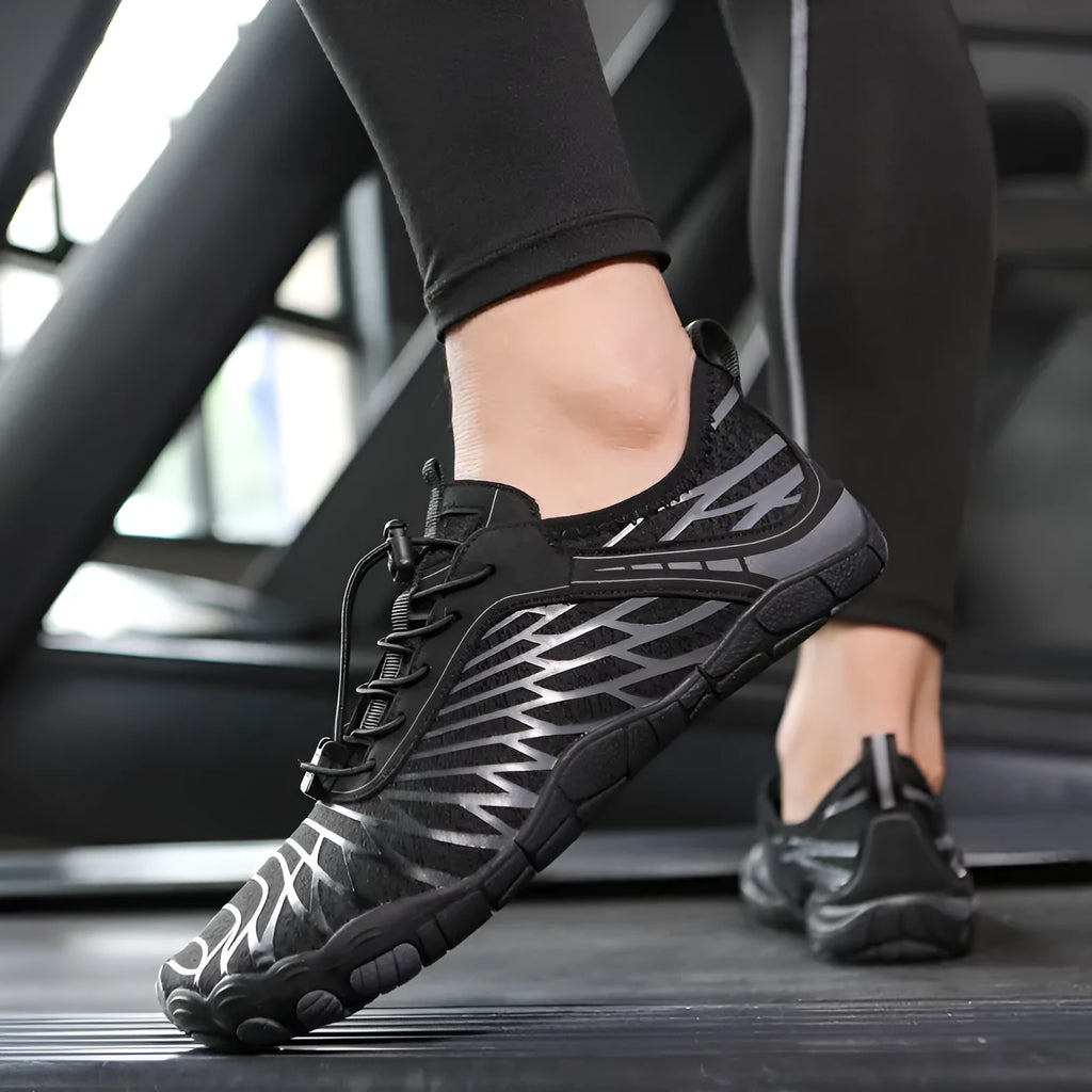 Pair of outdoor fashion sports upstream shoes with lace-up front and non-slip rubber sole in pink colour