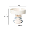 Raised ceramic cat bowl in animal design with wide opening for whisker-friendly feeding