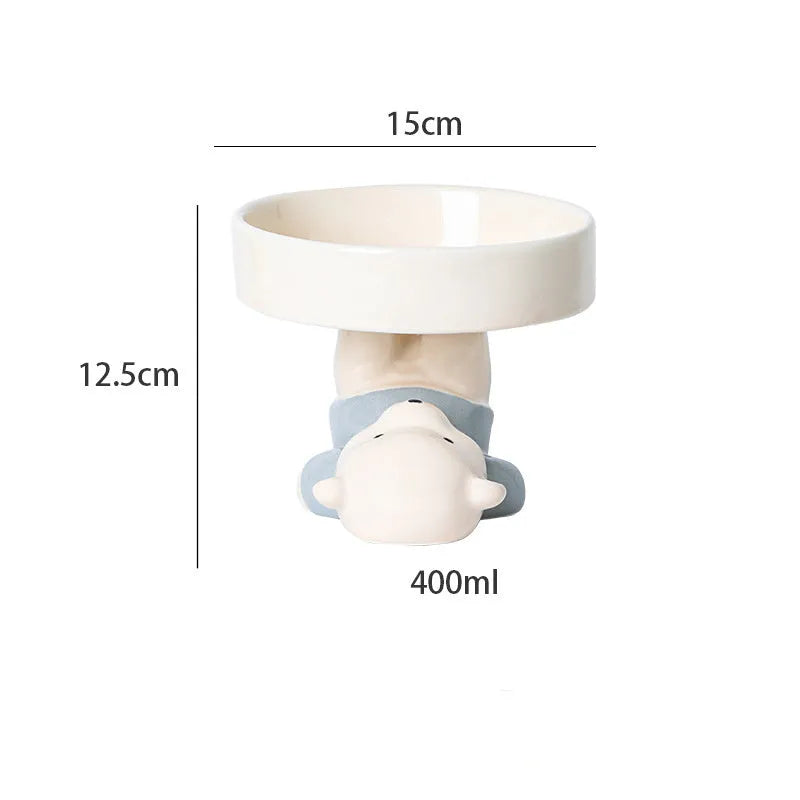 Raised ceramic cat bowl in animal design with wide opening for whisker-friendly feeding