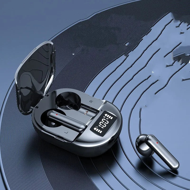 Black wireless Bluetooth in-ear headphones with digital display screen next to charging case