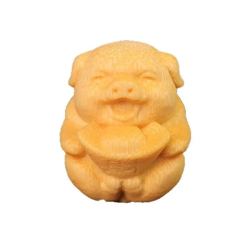 Solid bamboo carving ornament showing ingot pig design with 4cm height