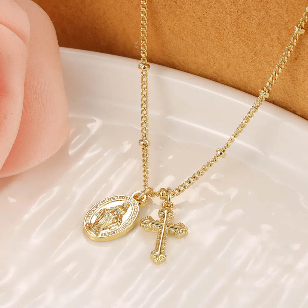 Gold geometric cross necklace with Virgin Mary ornament for women