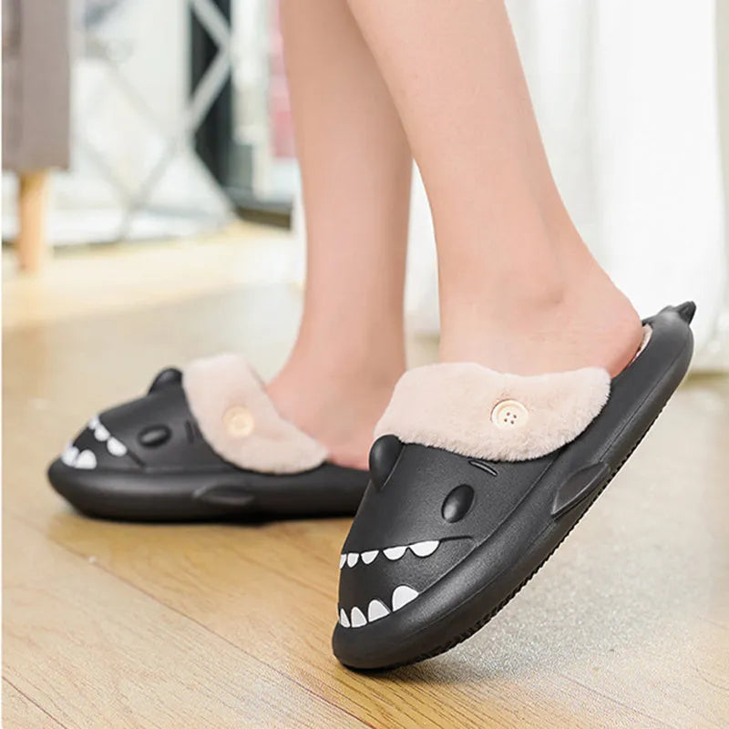 Winter shark button EVA house slippers in haze blue with sewing thread detail on indoor floor