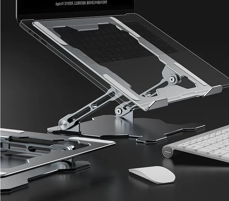 Grey adjustable aluminium laptop stand with hollow design, shown holding a silver laptop.