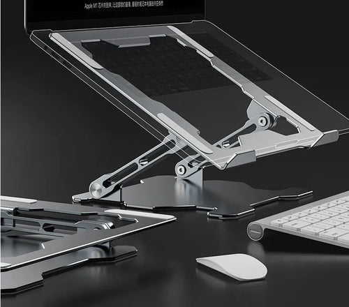 Grey adjustable aluminium laptop stand with hollow design, shown holding a silver laptop.