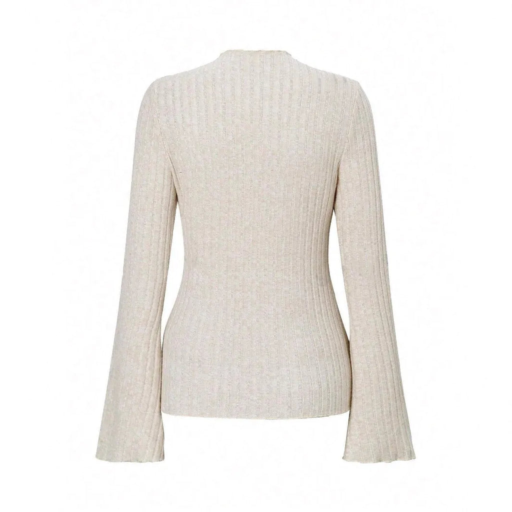 Long sleeve round neck top in black with sunken stripe pattern and lantern sleeves