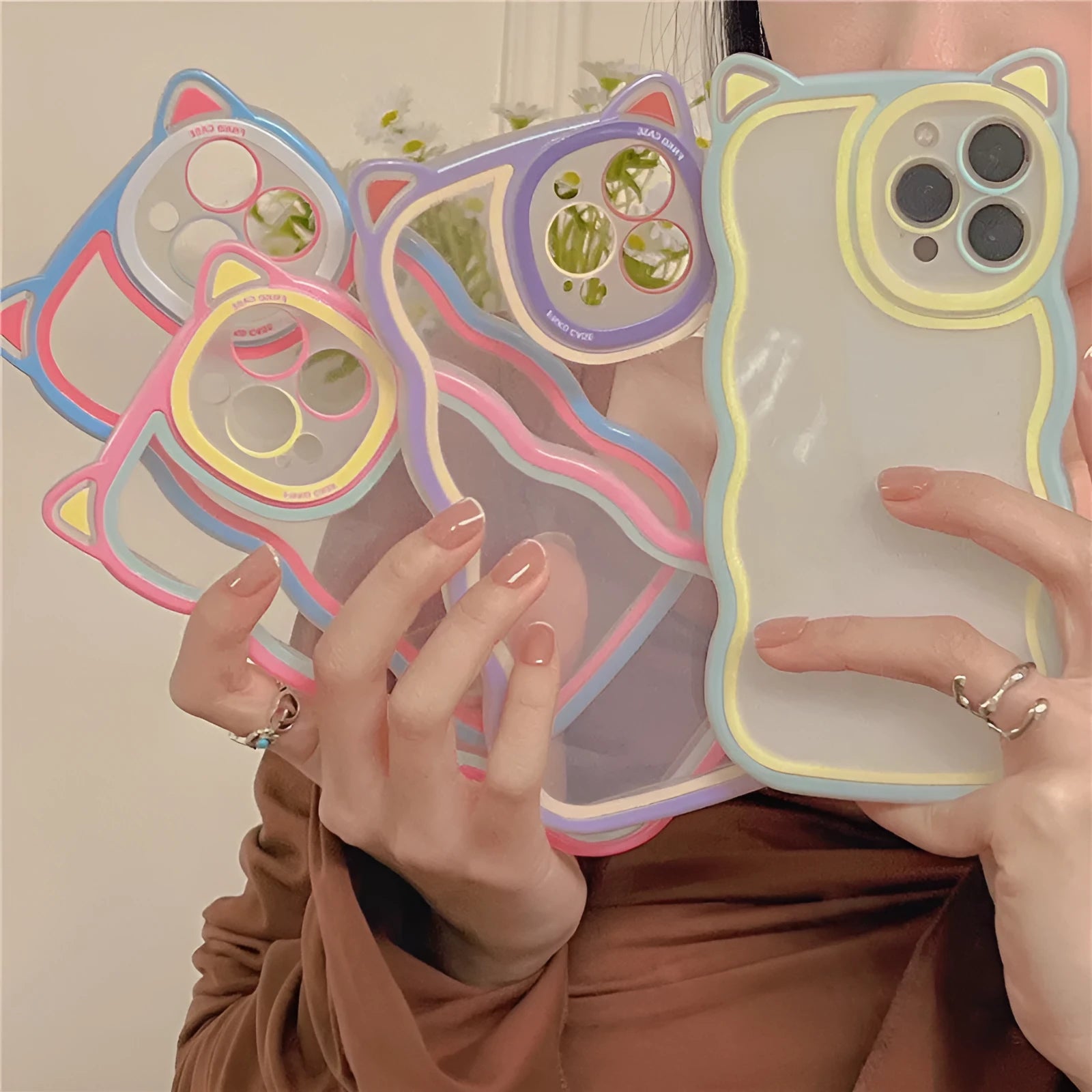 Creative wave cat ear cartoon TPU phone case for iPhone showing colourful solid rear cover