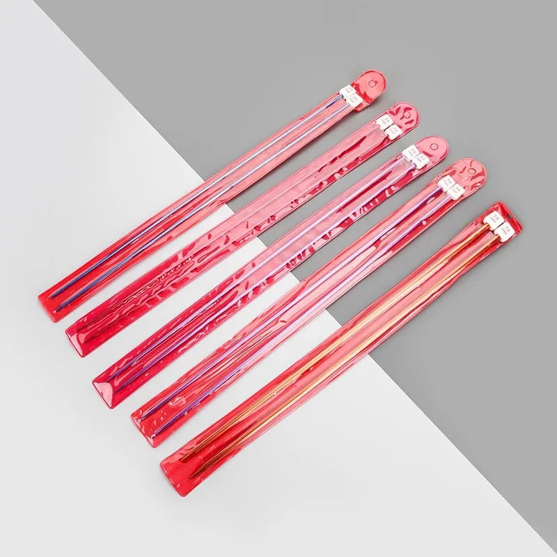 Set of lengthened crochet hooks with end caps displayed in sizes from 2.0mm to 10.0mm.