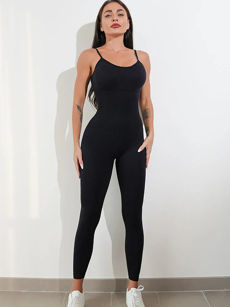 Women's black unitard jumpsuit with spaghetti straps and backless design for tummy control.