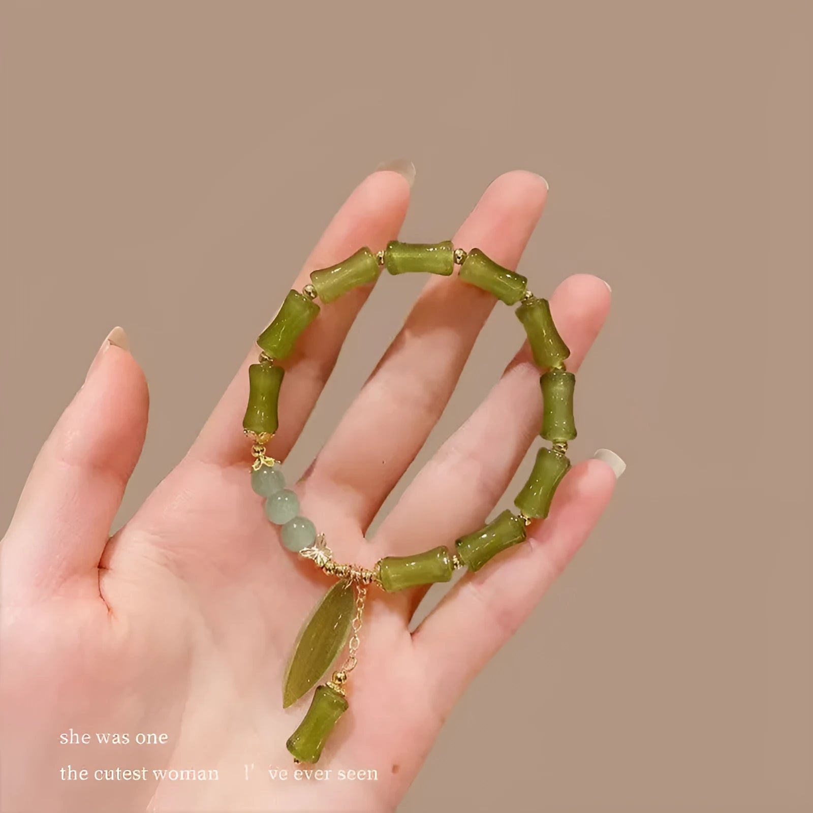 Chinese style bamboo leaf glass bracelet for women with a bamboo joint design.