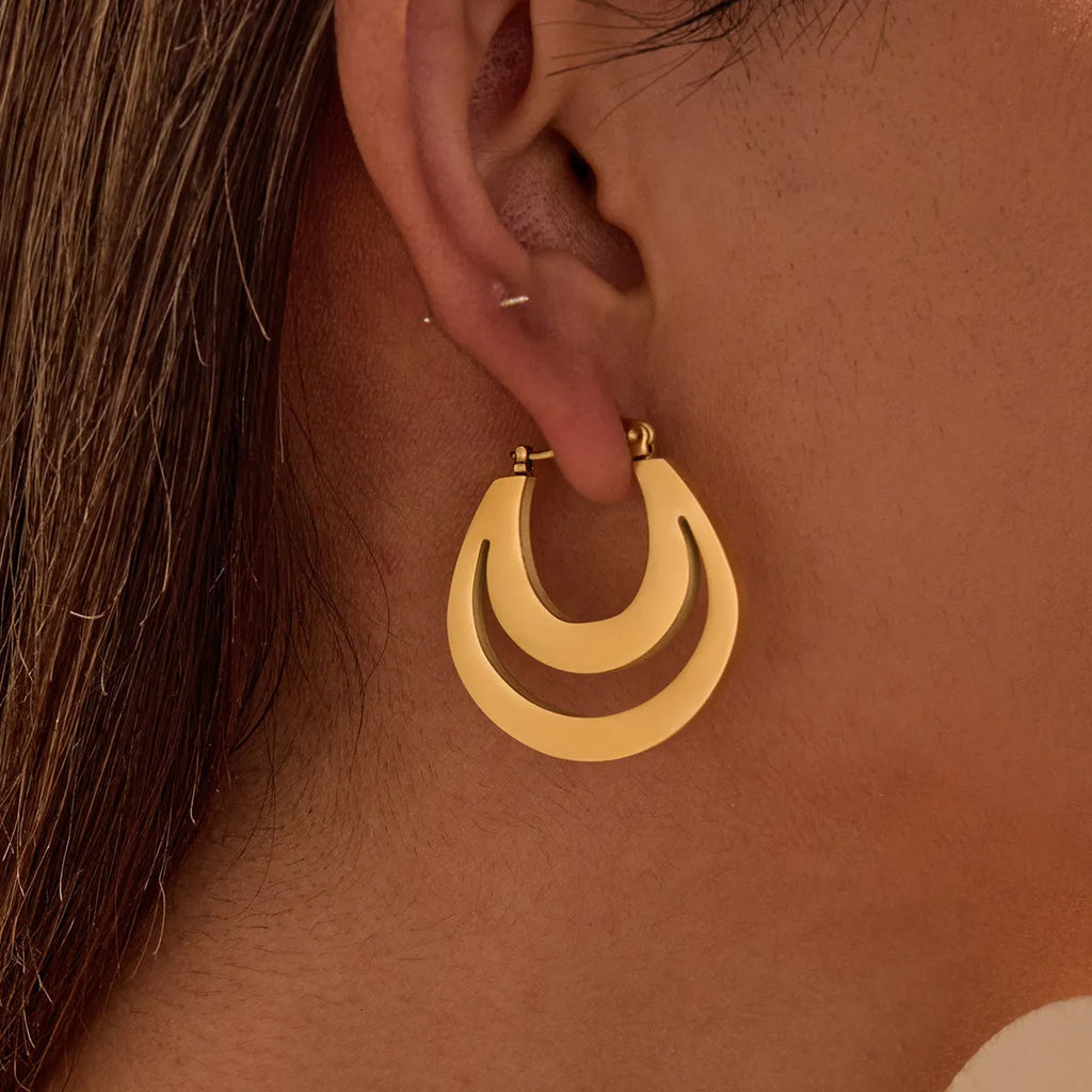 Geometric gold plated French earrings with round elements on stainless steel base