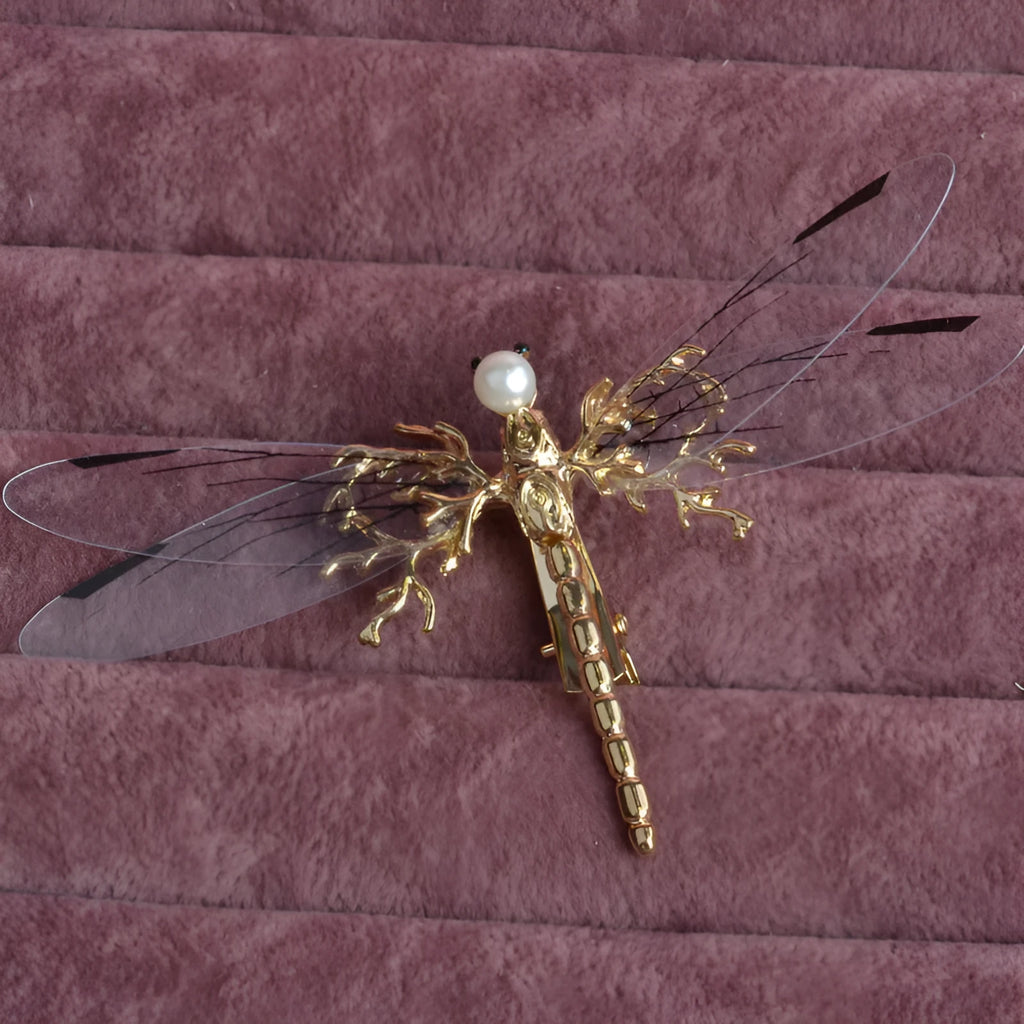 Gold dragonfly side clip headdress with detailed alloy construction and electroplated finish