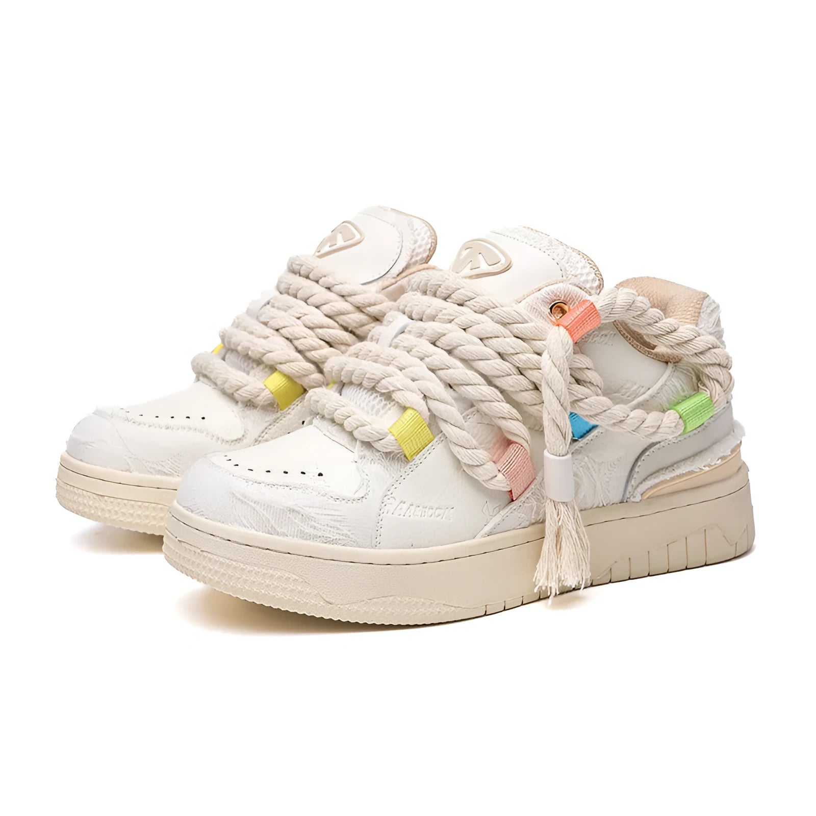 Creamy white Old Damage retro skate shoes with lace-up front, low-top platform heel, and rubber sole.
