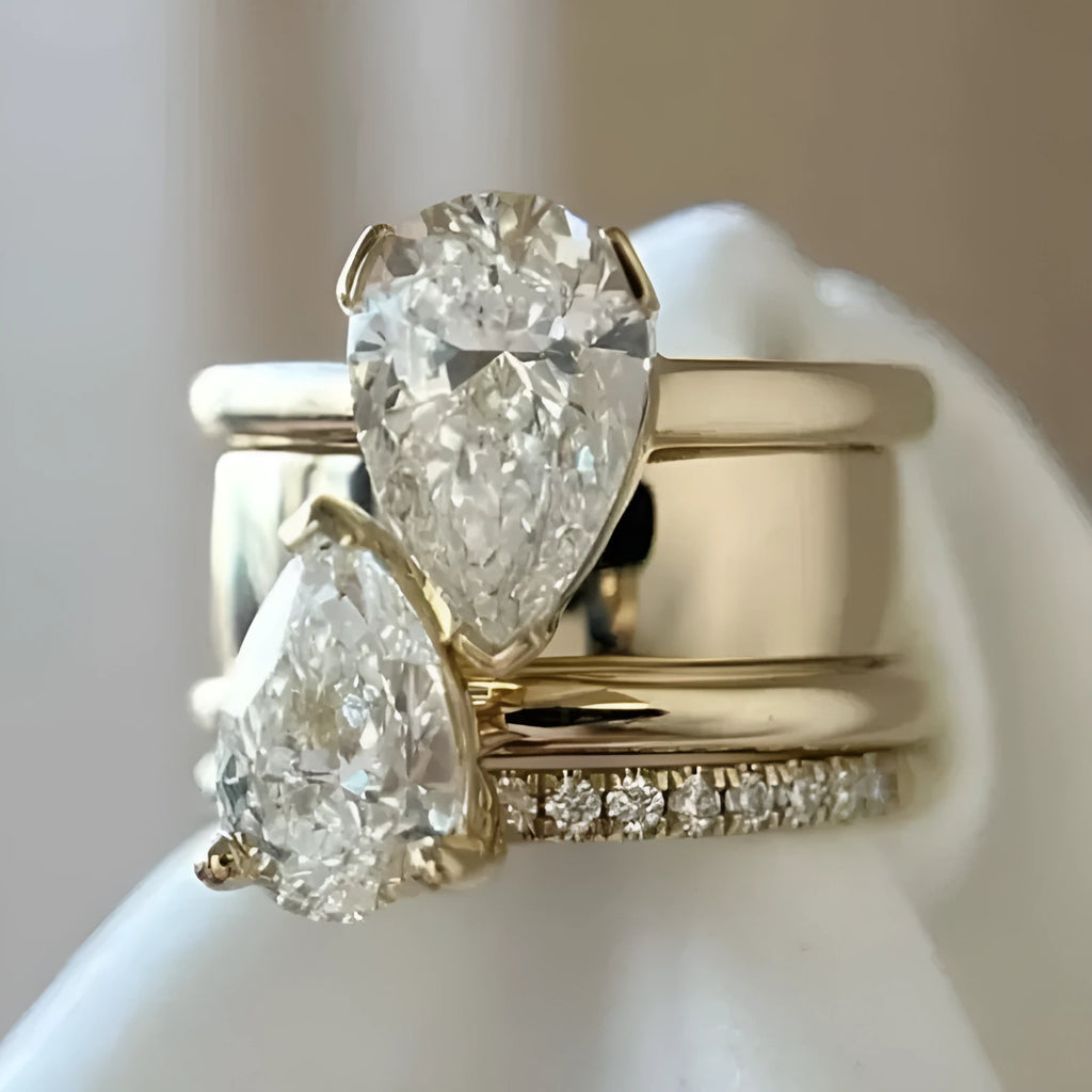 Fashion micro inlaid zircon ring in gold colour with drop-shaped stone, brass material, US size 7