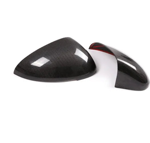 Pair of black true carbon fibre rearview mirror covers for a Porsche Macan.