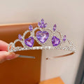 Children's electroplated alloy crown headband with pink crystals, shown on a model for scale.