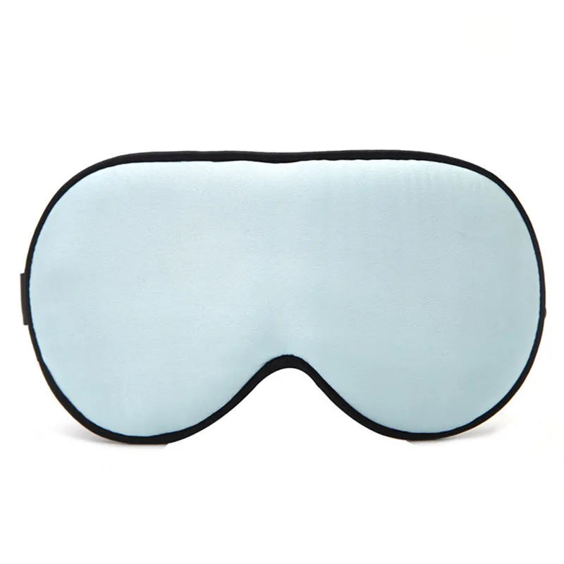 Double-sided mulberry silk eye mask in champagne colour with embroidered print.