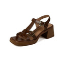 Women's black retro sandals with a T-shaped buckle, open square toe, platform, and chunky heel.