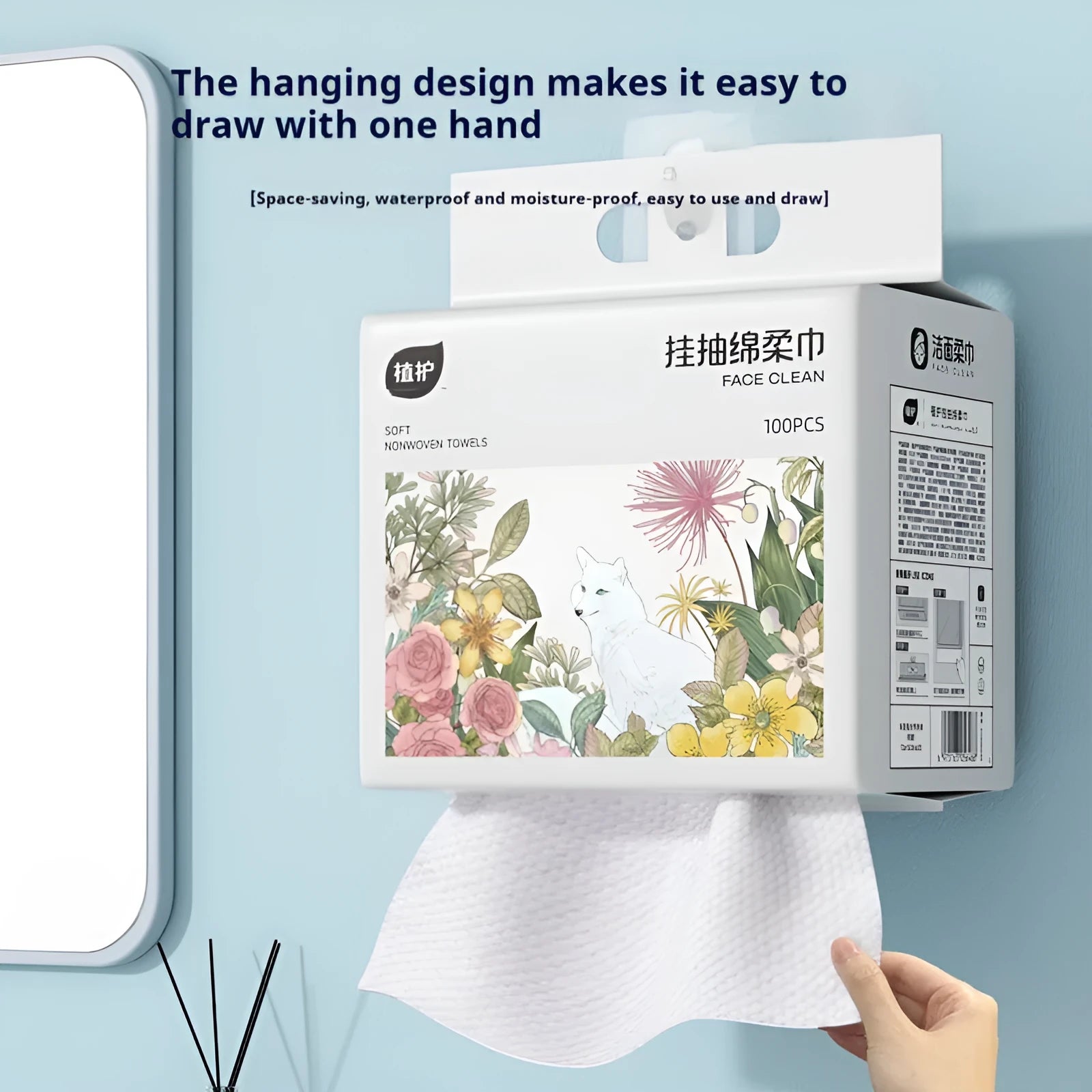 A roll of disposable white face cloths with a removable hook for hanging storage.