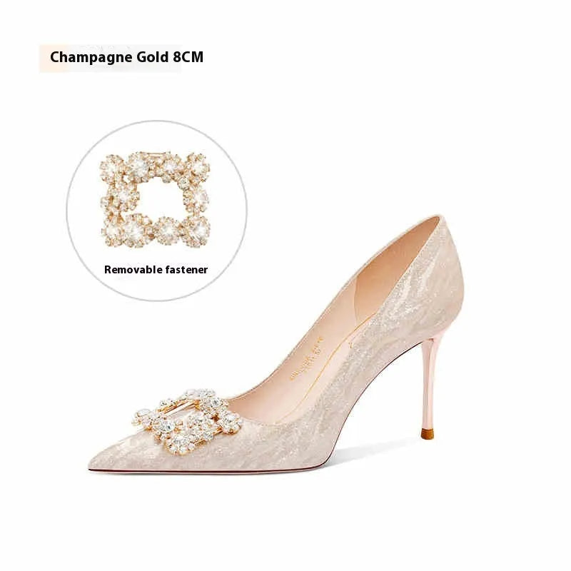 Champagne gold pointed-toe stiletto high heels with rhinestone decoration.