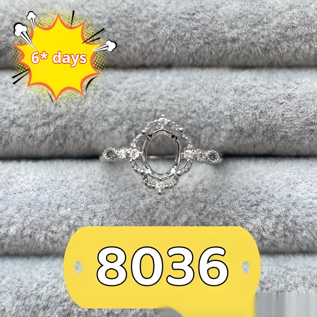 Oval denier ring ornament with 6x8mm stone, open mouth design, and five-pointed star detail