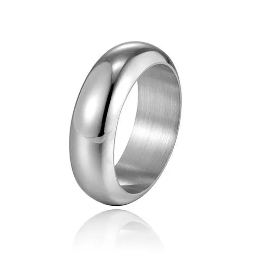 Glossy electroplated titanium steel ring shown in black, gold, and steel colour on a neutral background.