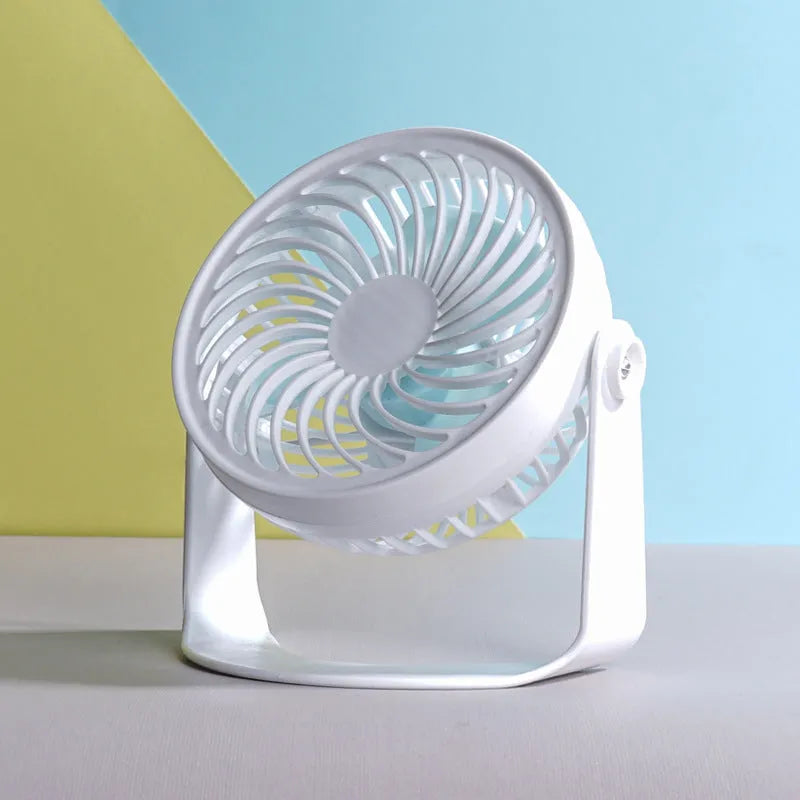 Compact USB desk fan with three blades and brushless motor for quiet operation below 36dB