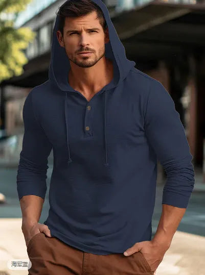 Cotton pullover sports hoodie in apricot colour on a hanger.