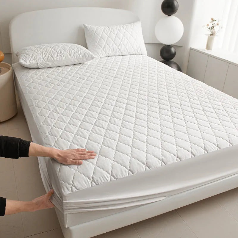 Diamond lattice quilted waterproof mattress protector set with fitted sheet and pillowcases in bamboo fibre