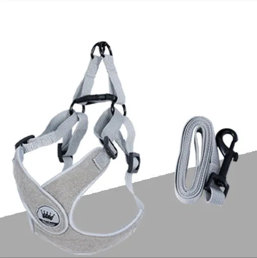 Adjustable dog and cat harness with breathable mesh panels and metal ring attachment