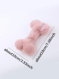 Plush bone-shaped dog toy in blue, pink or yellow with a squeaker for interactive chewing play.