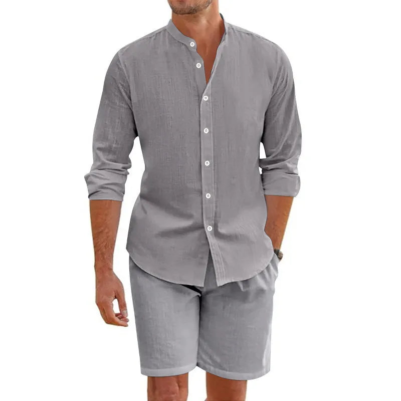 Men's linen blend summer suit set showing short sleeve lapel shirt with matching drawstring shorts in dark grey colour