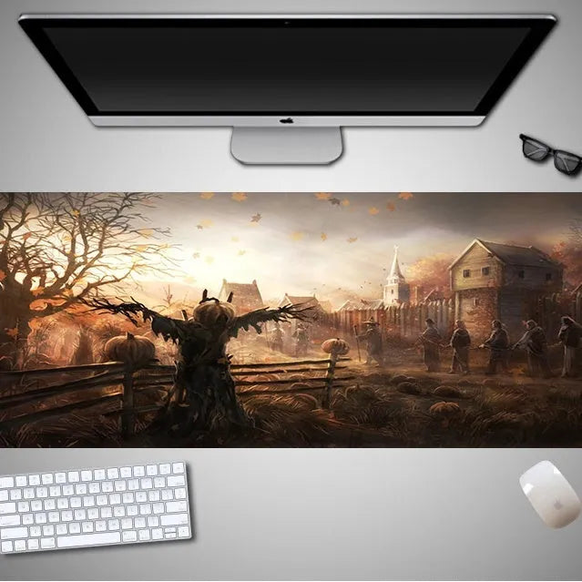 Oversized Halloween-themed gaming mouse pad with non-slip base on a desk.