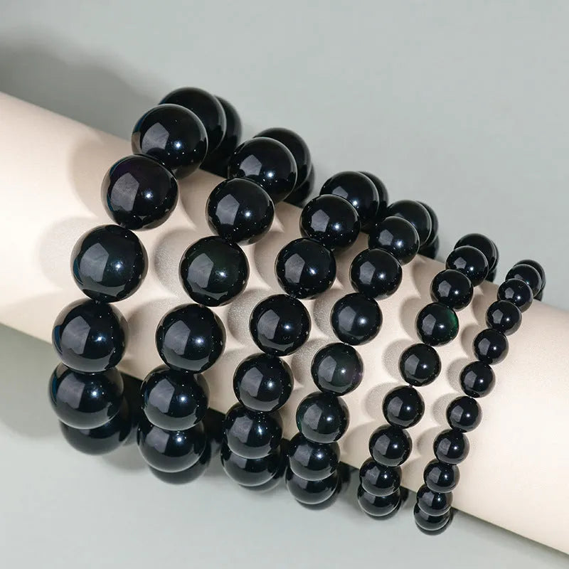 Hand-woven round obsidian crystal couple bracelet set showing ethnic-style design with multiple bead size options