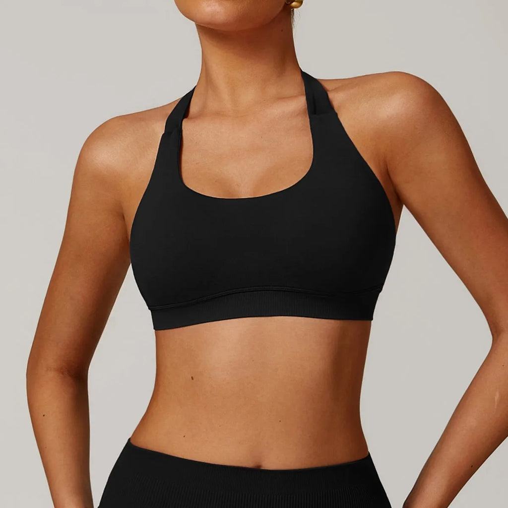 Women's halter yoga bra with removable pads in five colour options showing front and back views
