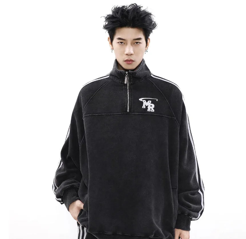 Black retro sports hoodie with a stand collar and long sleeves, shown on a model.