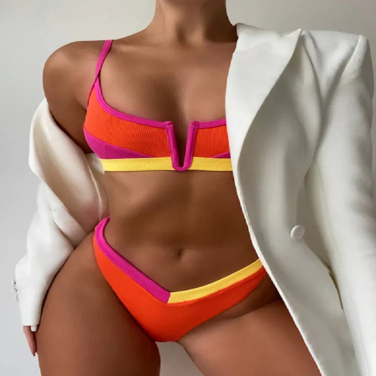 Women's high-waist triangle bikini swimsuit set in polyester fabric with split shorts